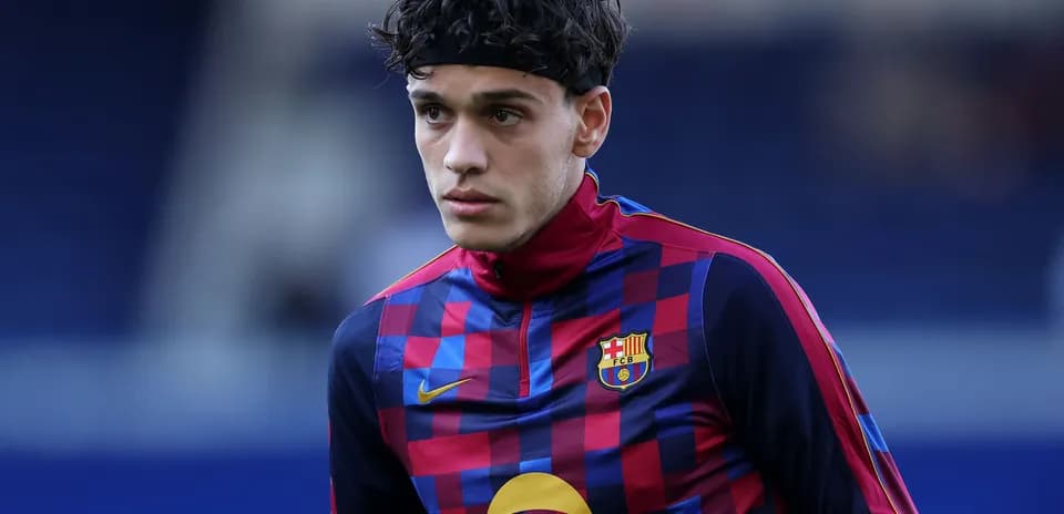 Player wearing Barcelona training kit on field