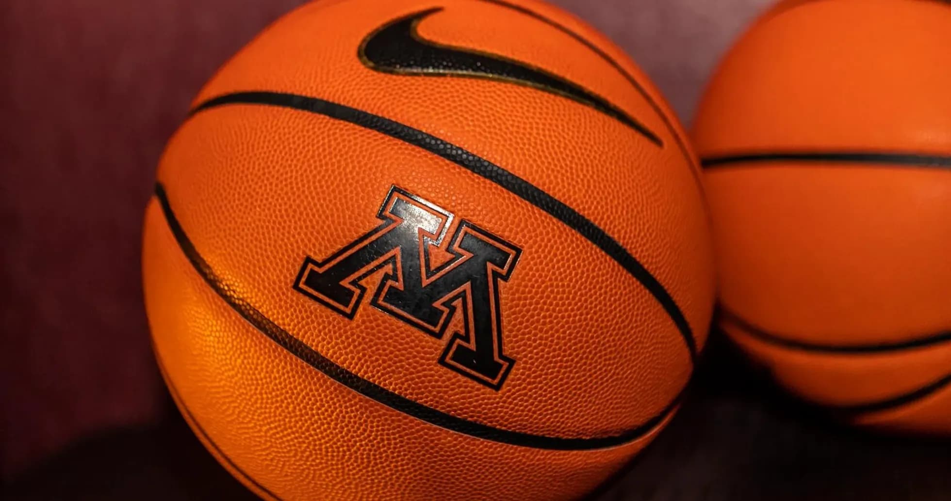 Close-up of basketballs with Nike and M logo