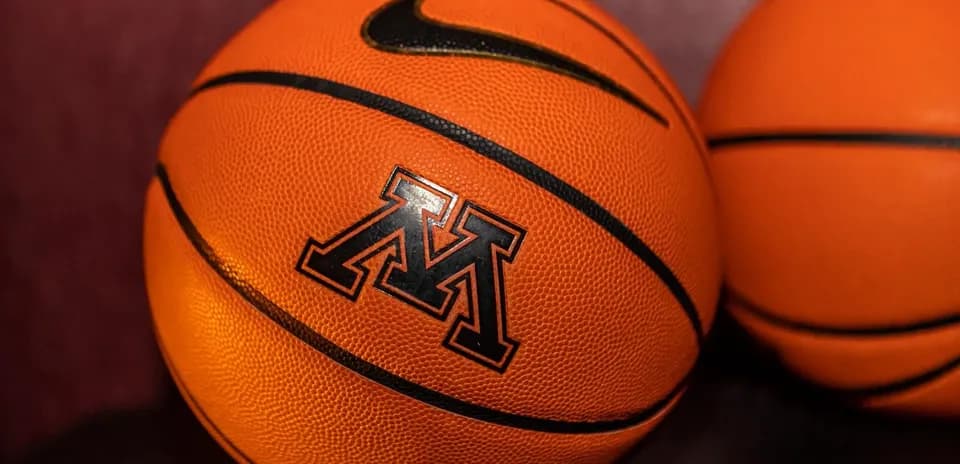 Close-up of basketballs with Nike and M logo