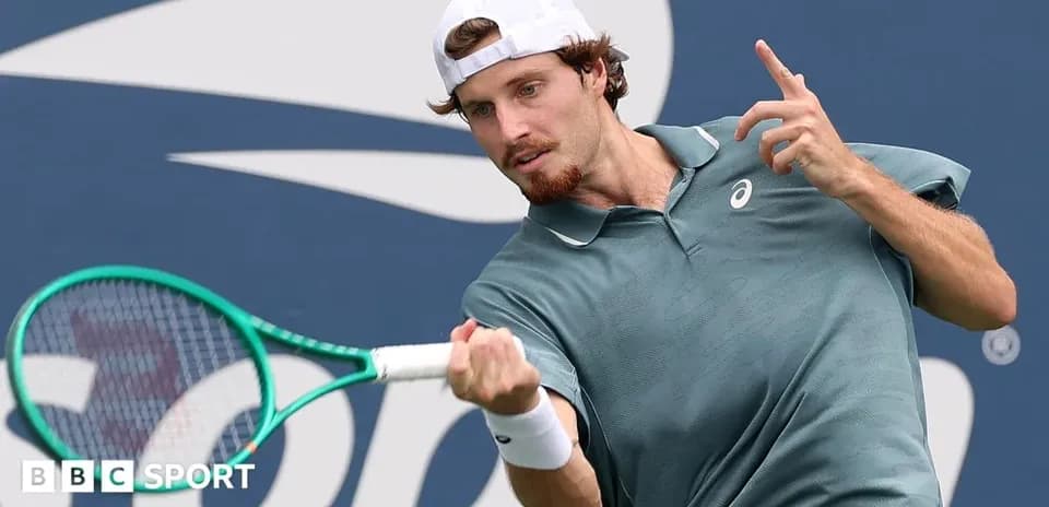 Tennis player hitting a forehand shot on court