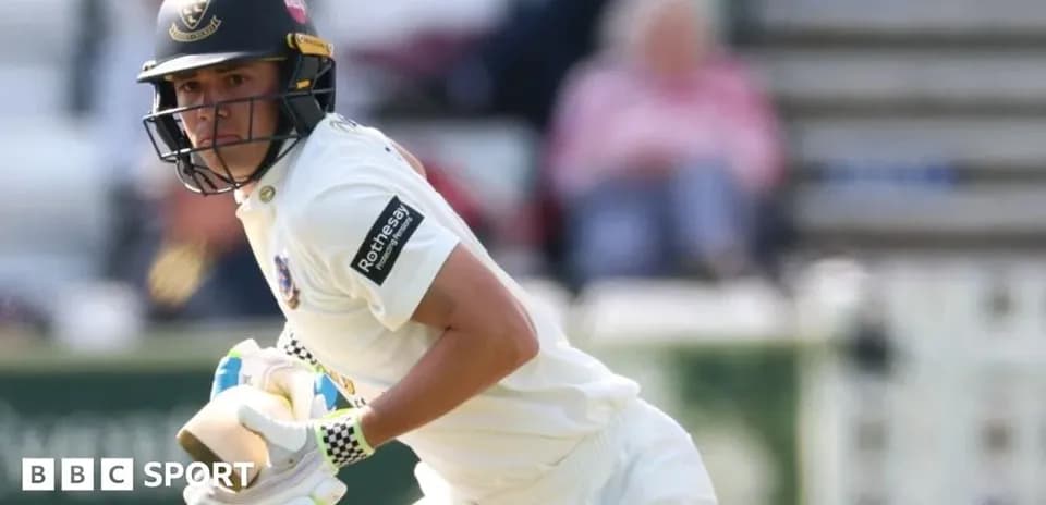 Cricketer running while batting in a match