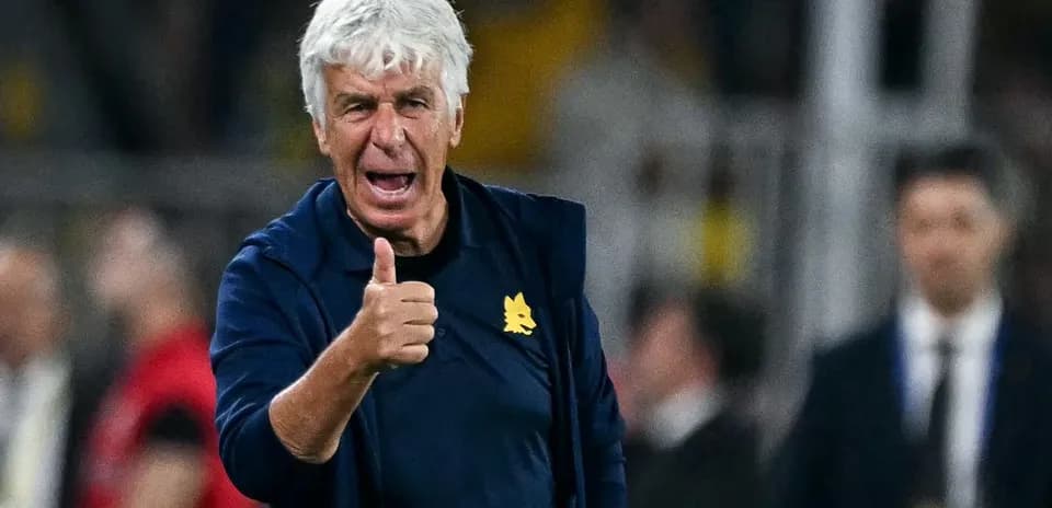 Coach giving thumbs up during match celebration