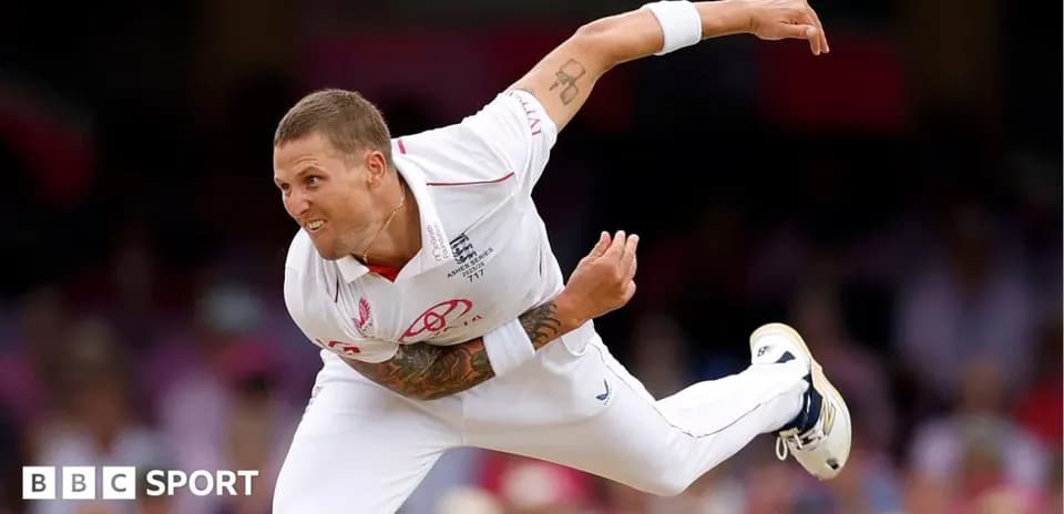 Cricketer bowling during a match at the stadium