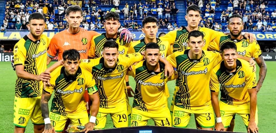 Team lineup posing for photo before the match