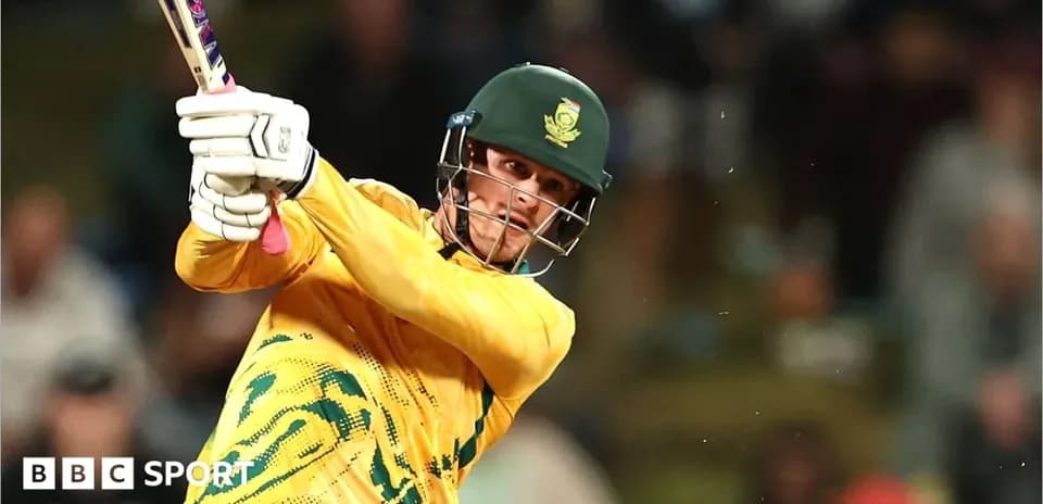 Batter striking the ball during a cricket match