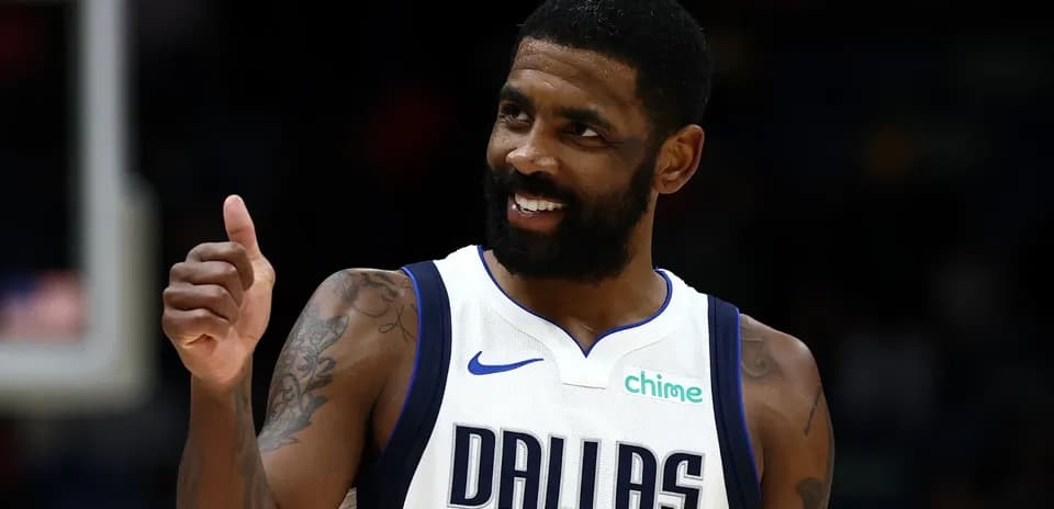Player giving a thumbs up in Dallas jersey