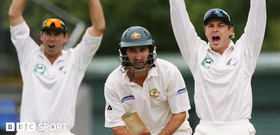 Batsman in action as bowlers appeal for wicket