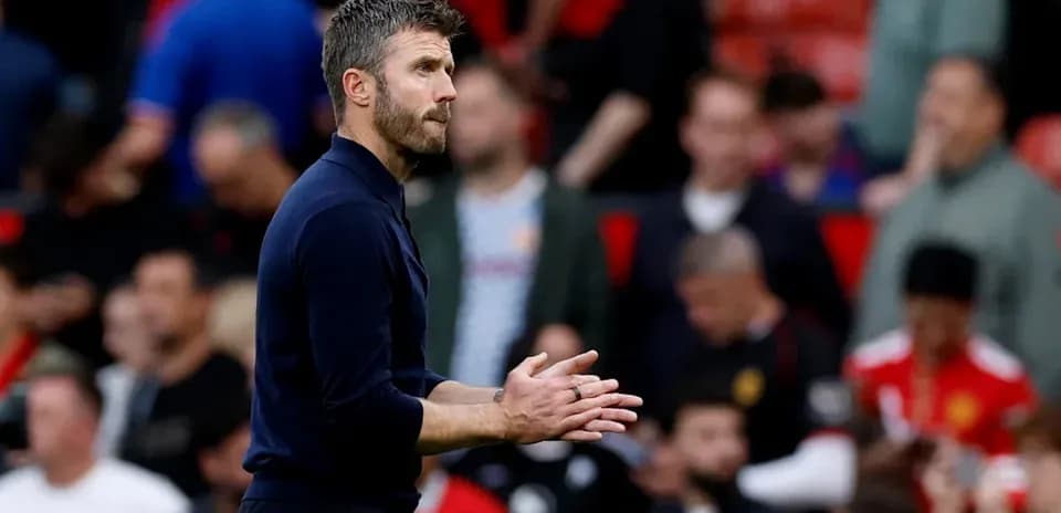Coach clapping during match at stadium