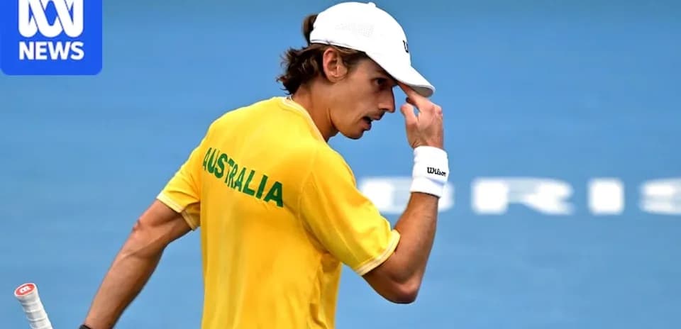 Tennis player in yellow Australia jersey during match