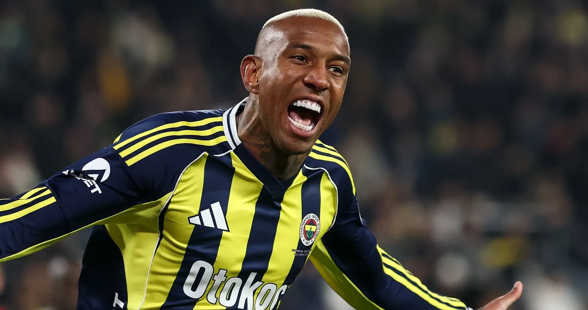 Player celebrating a goal in Fenerbahçe jersey