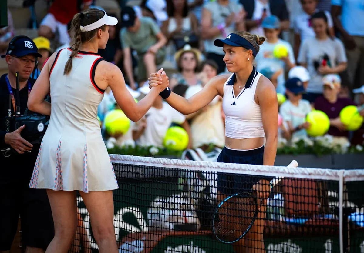 Players shaking hands at the net after match