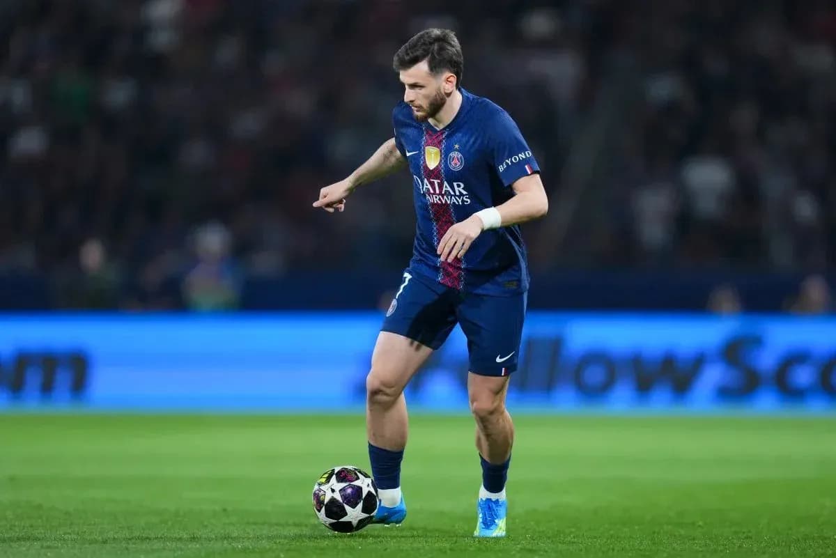 Player dribbling ball during match for PSG