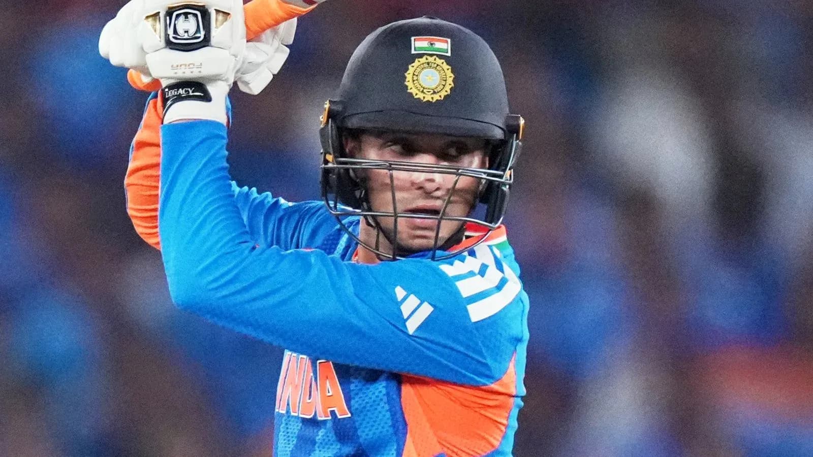 Batter preparing to hit the ball in cricket match