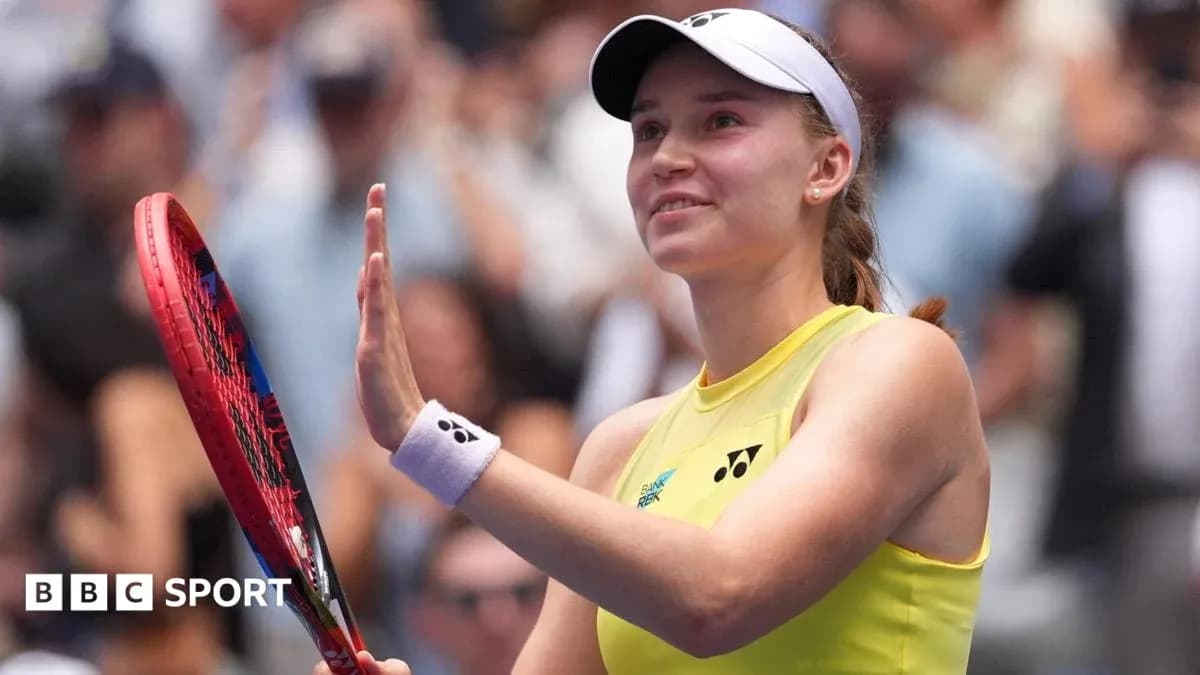 Tennis player waving with racket in hand