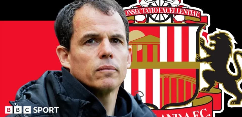Coach with Sunderland AFC logo in background