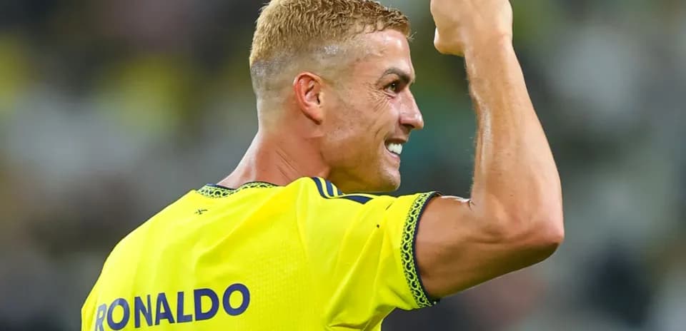 Player celebrating with clenched fist on field
