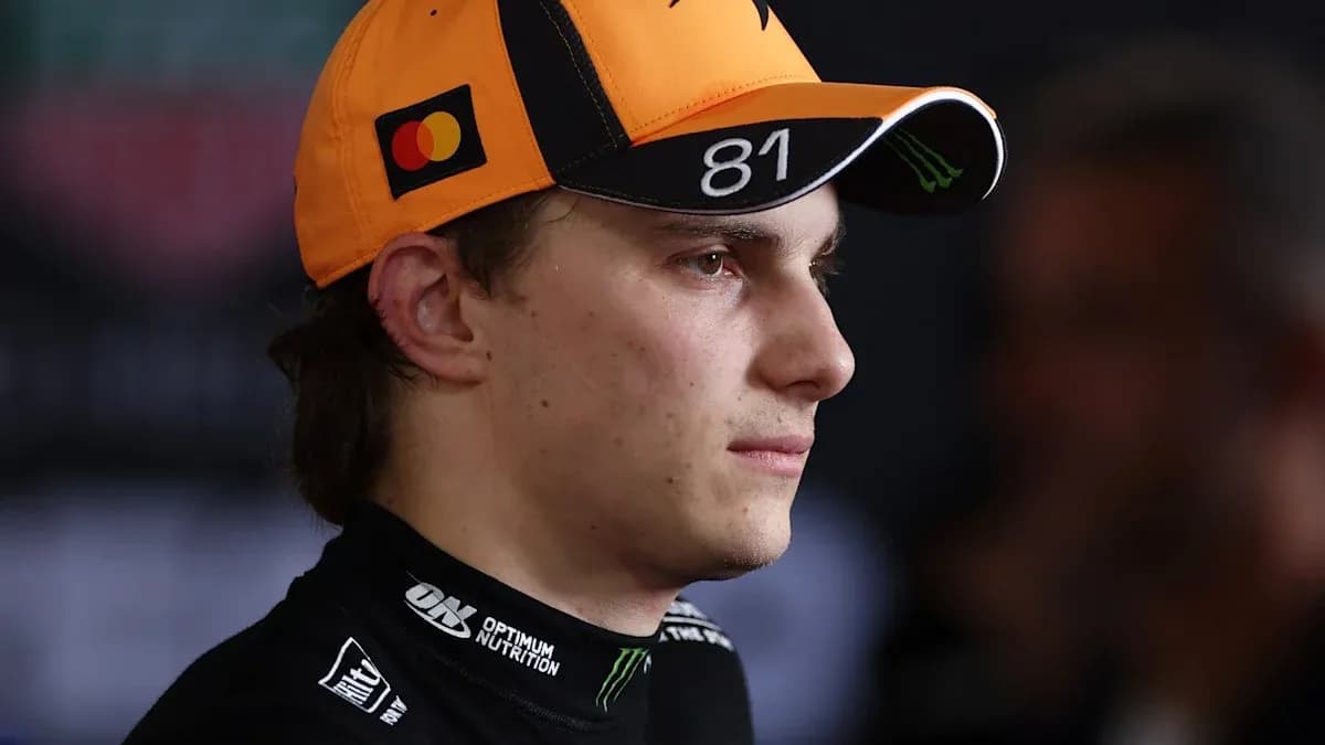 Driver wearing cap during press event