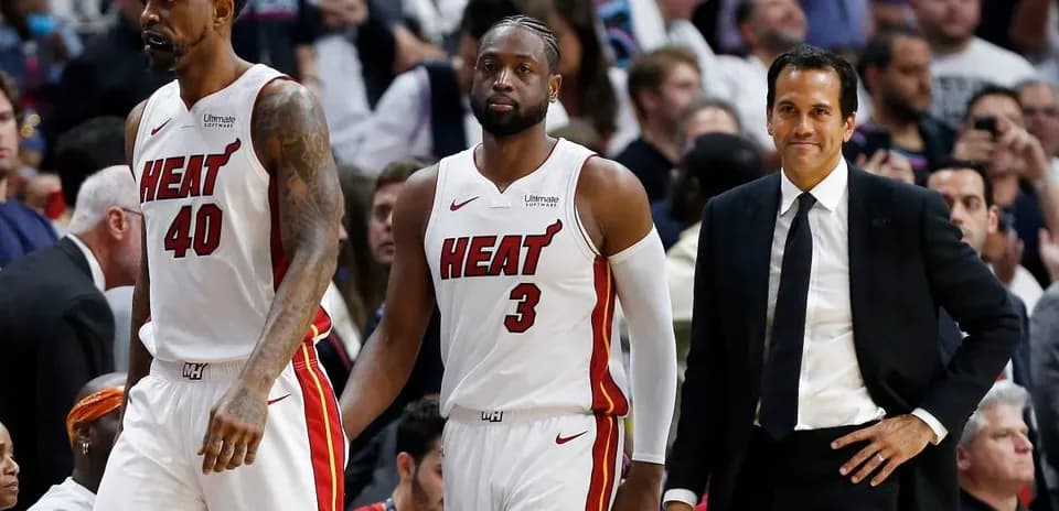 Miami Heat players and coach during a game
