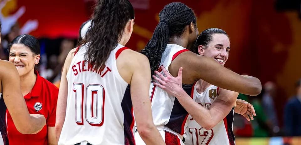 Players celebrating together after a basketball game