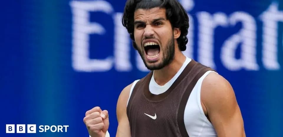 Tennis player celebrating after winning a point