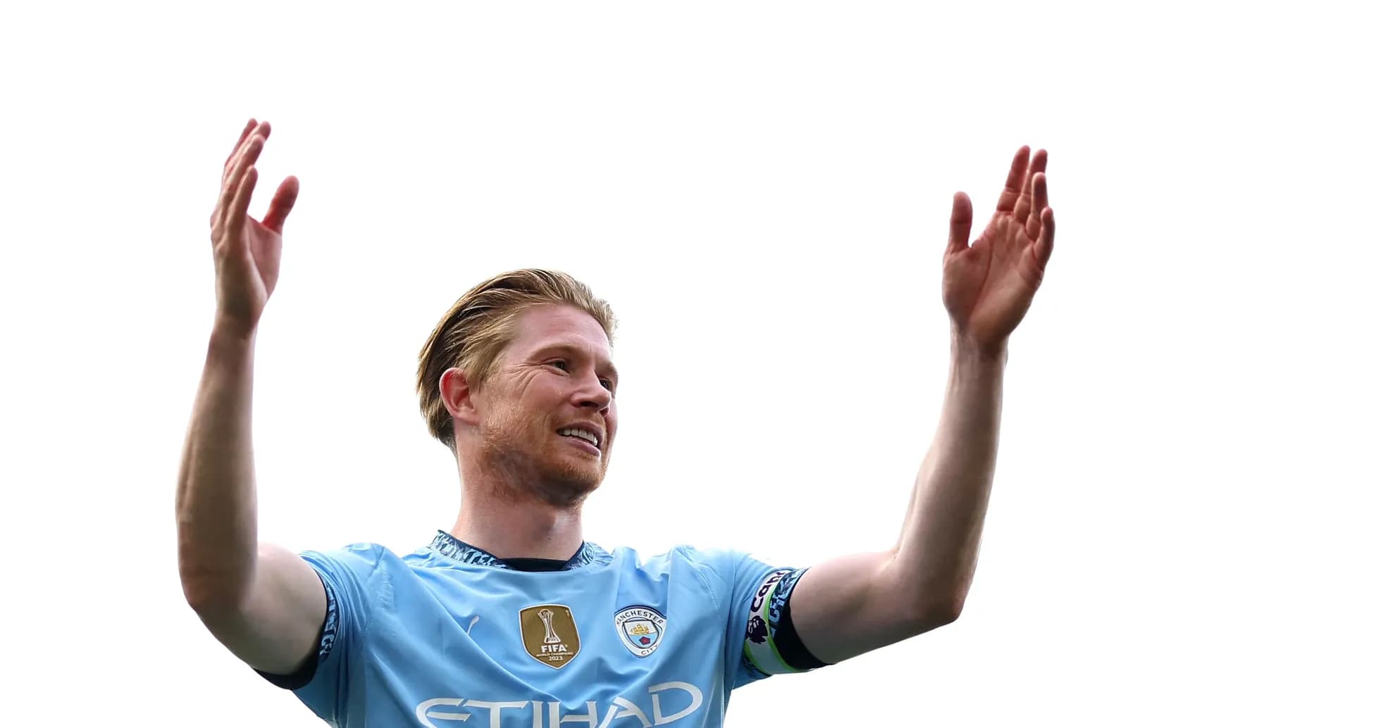 Player celebrating with raised arms in blue jersey