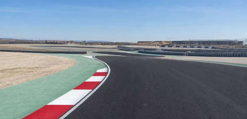 Curved section of a racetrack with runoff area