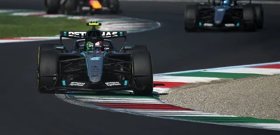 Mercedes Formula 1 car navigating a corner on track