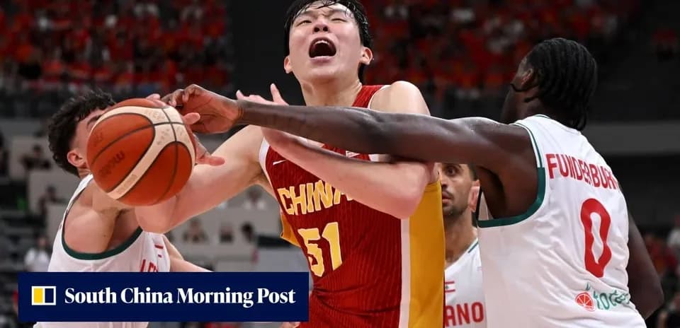 Player from China being defended by opponents during game