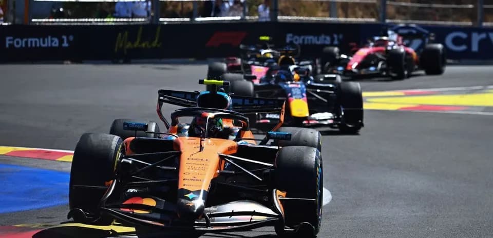 Formula 1 cars racing on track during event