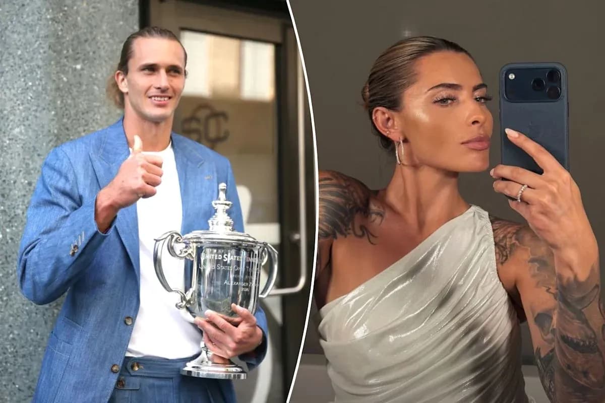 Man holding trophy and woman taking selfie