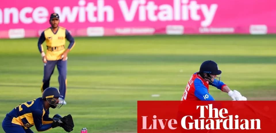 Cricketer batting while wicketkeeper crouches behind