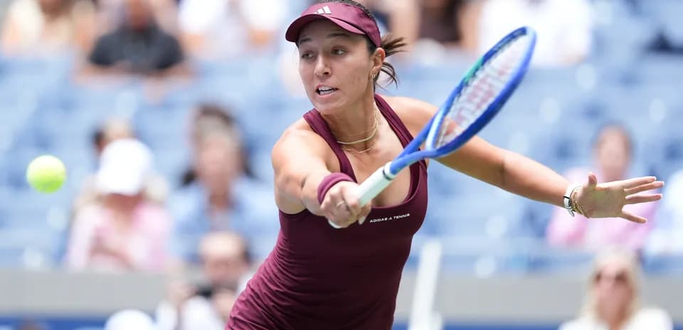 Player hitting a forehand during tennis match