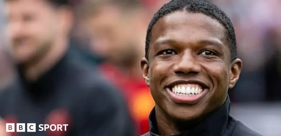 Player smiling during warm-up before the match