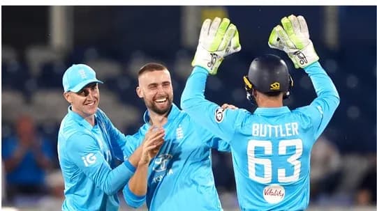 England players celebrating a wicket during match