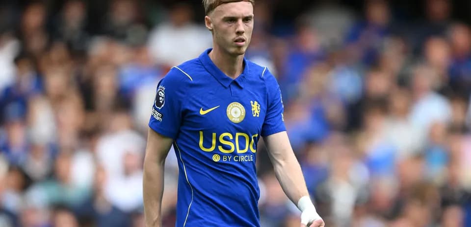 Player wearing Chelsea kit on the pitch