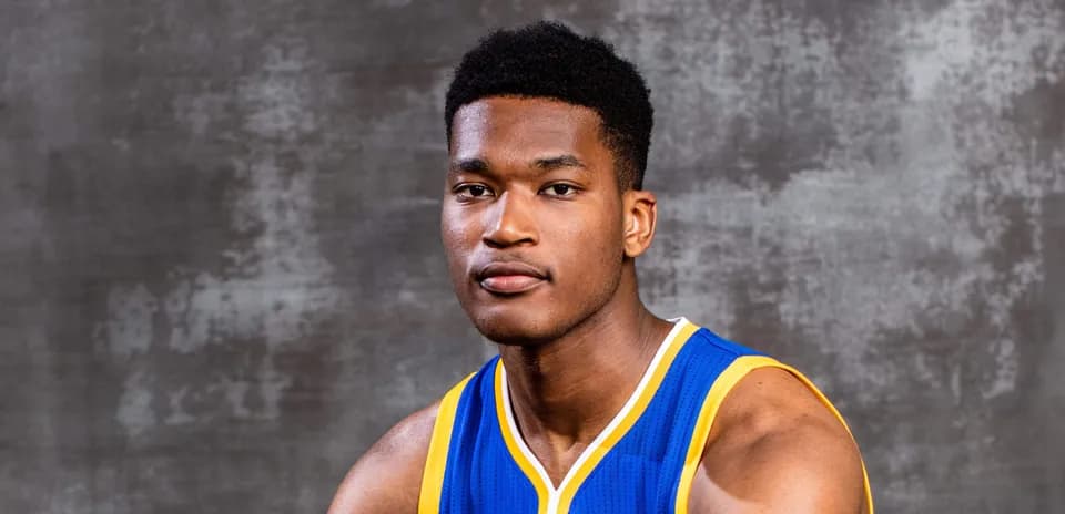 Basketball player posing in team jersey