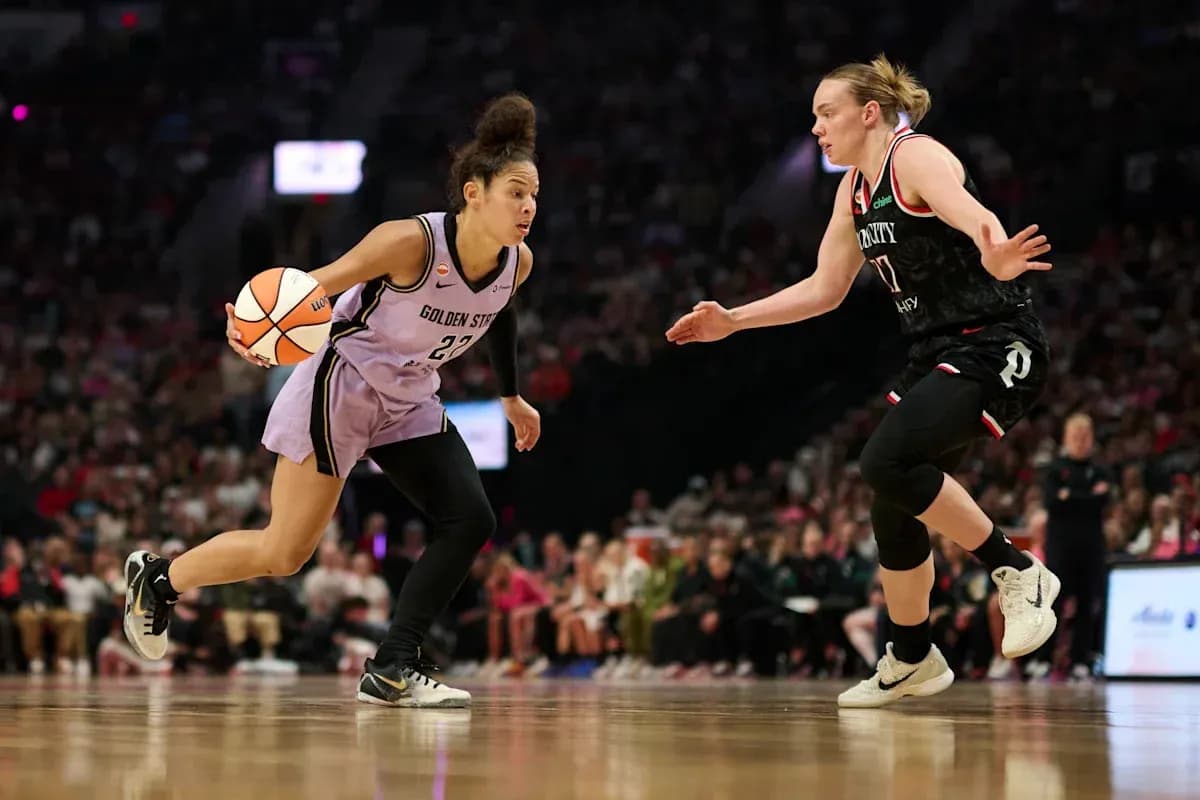Player dribbling basketball during competitive match