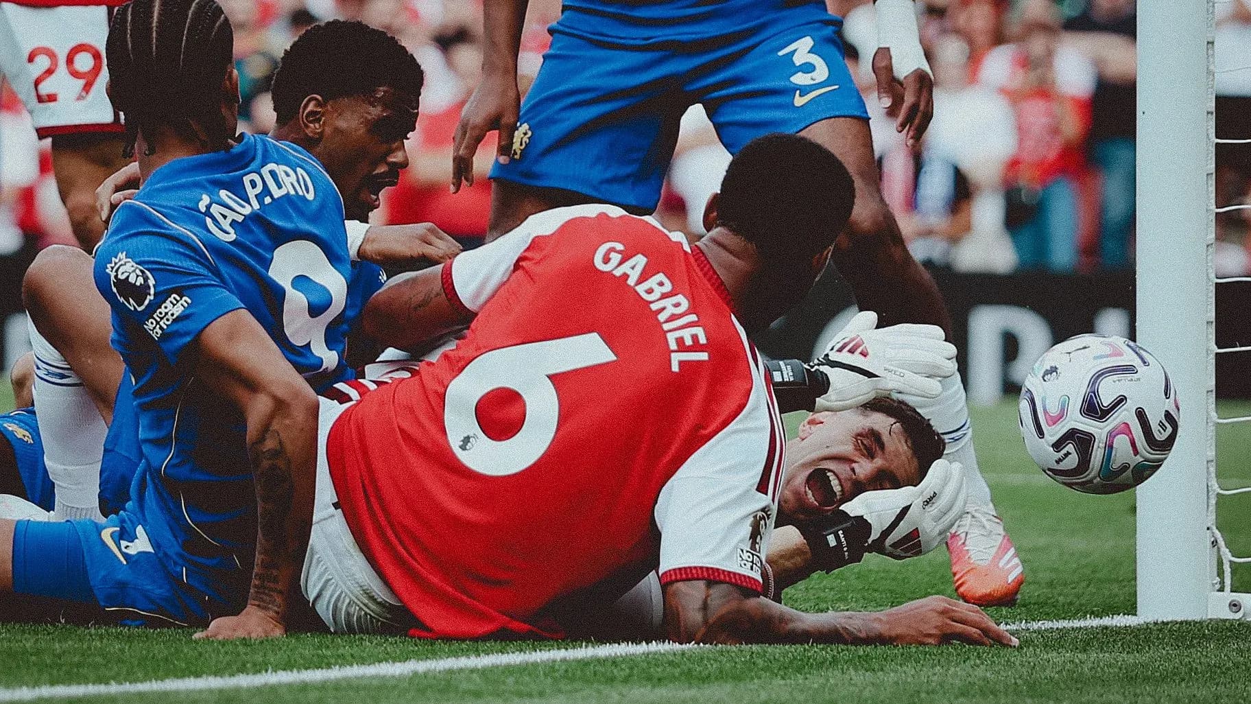 Players contesting near the goal during a match