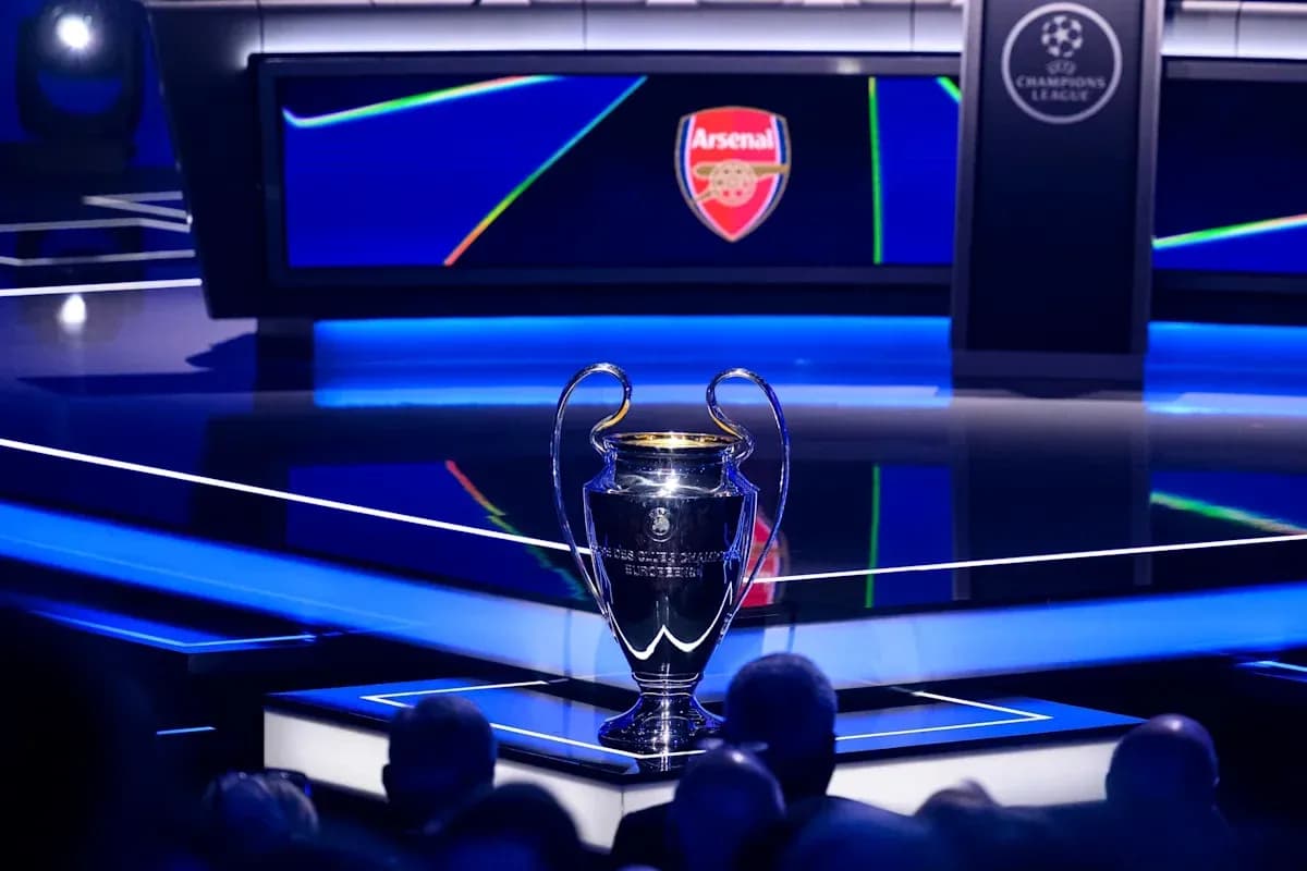 Champions League trophy displayed on stage