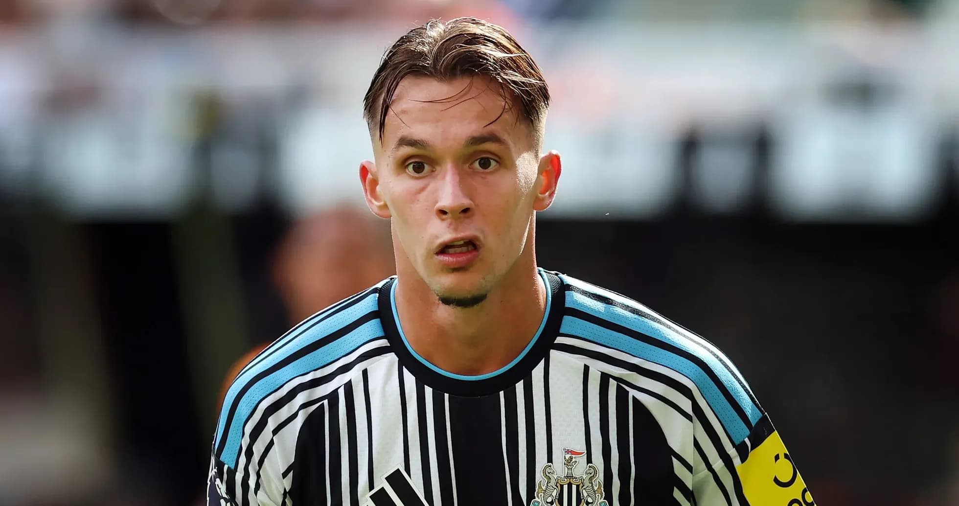 Newcastle United player focused during match