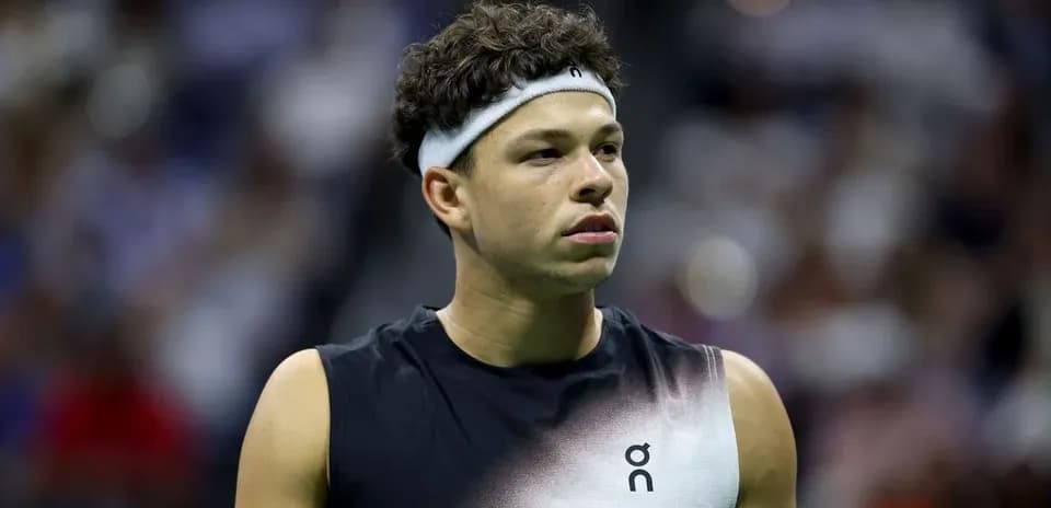 Tennis player during match at indoor arena