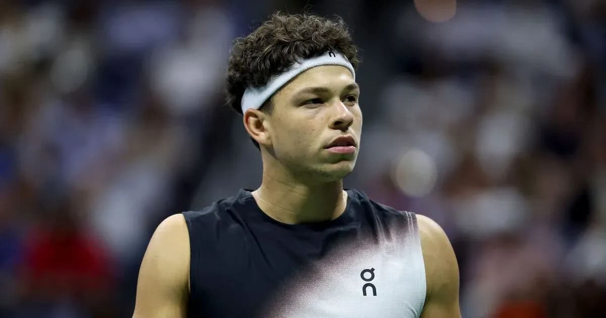 Tennis player during match at indoor arena