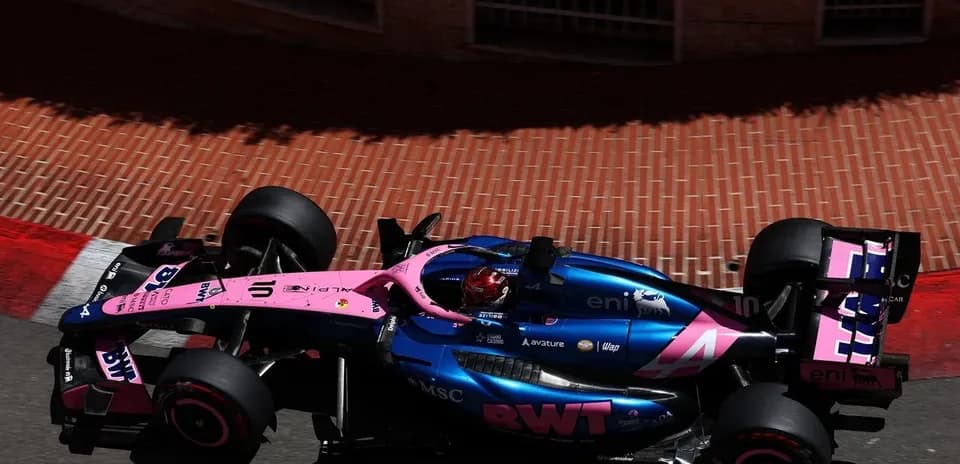 Formula 1 car navigating a corner on track