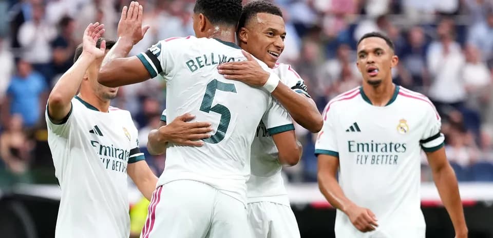 Players celebrating after a goal for Real Madrid