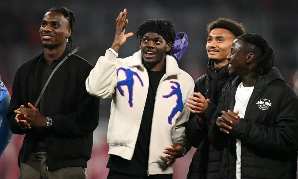 Four players celebrating together at an event