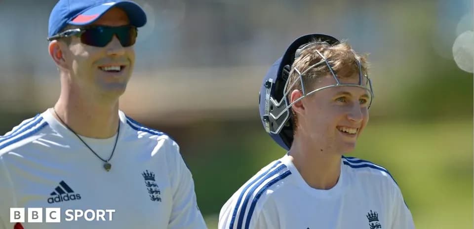 Two cricketers smiling during training session outdoors