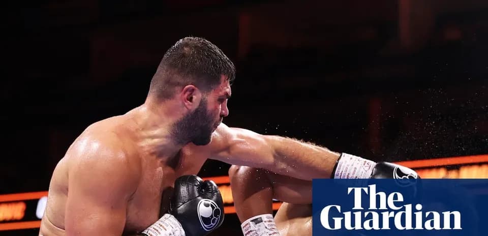 Boxer delivering a punch during a match