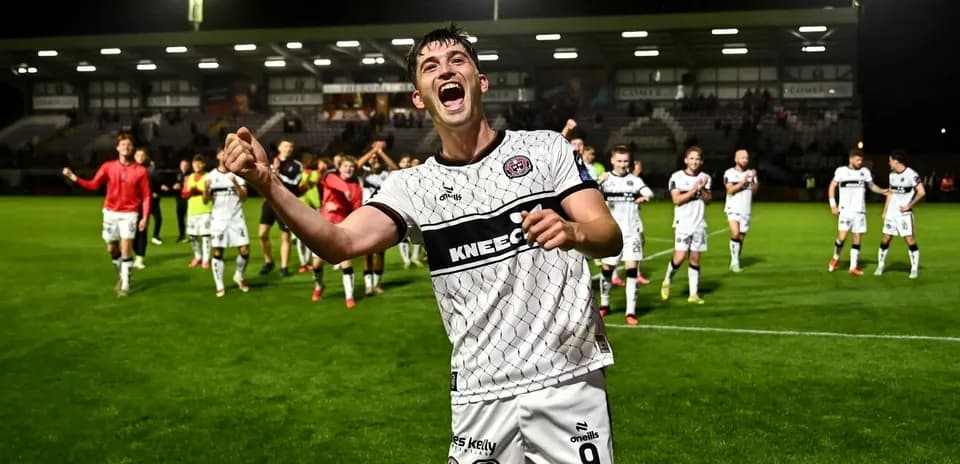 Player celebrating with teammates after a match