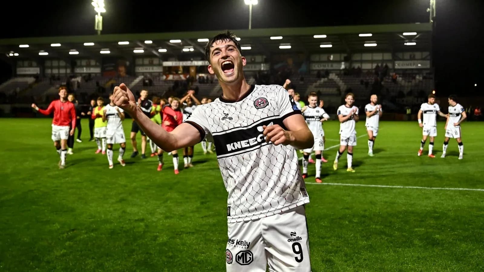 Player celebrating with teammates after a match