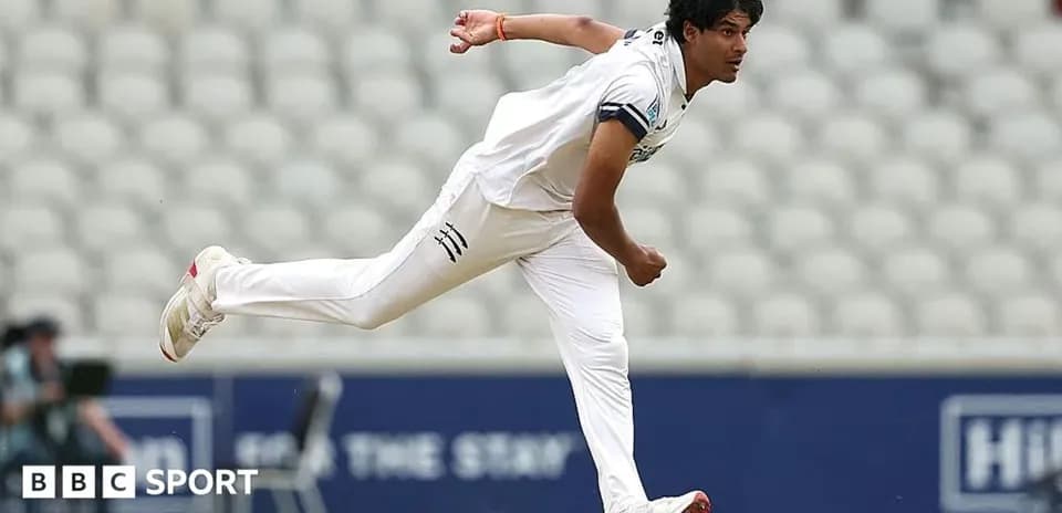 Bowler delivering a ball in a cricket match